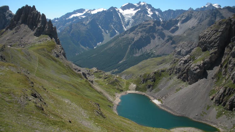 Aerial View Of Lake In Valley In Mountains