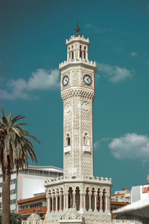 Free The iconic Izmir Clock Tower, a historic landmark in Turkey, stands tall under a clear blue sky. Stock Photo