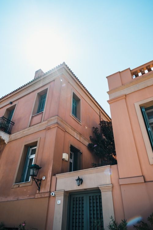 Free Discover the elegance of Mediterranean architecture in Peloponnes under clear summer skies. Stock Photo