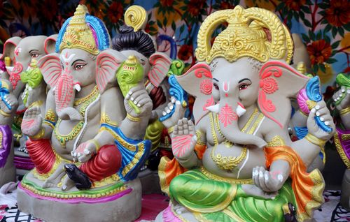 Free Vibrant and detailed sculptures of Hindu deity Ganesha on display. Stock Photo