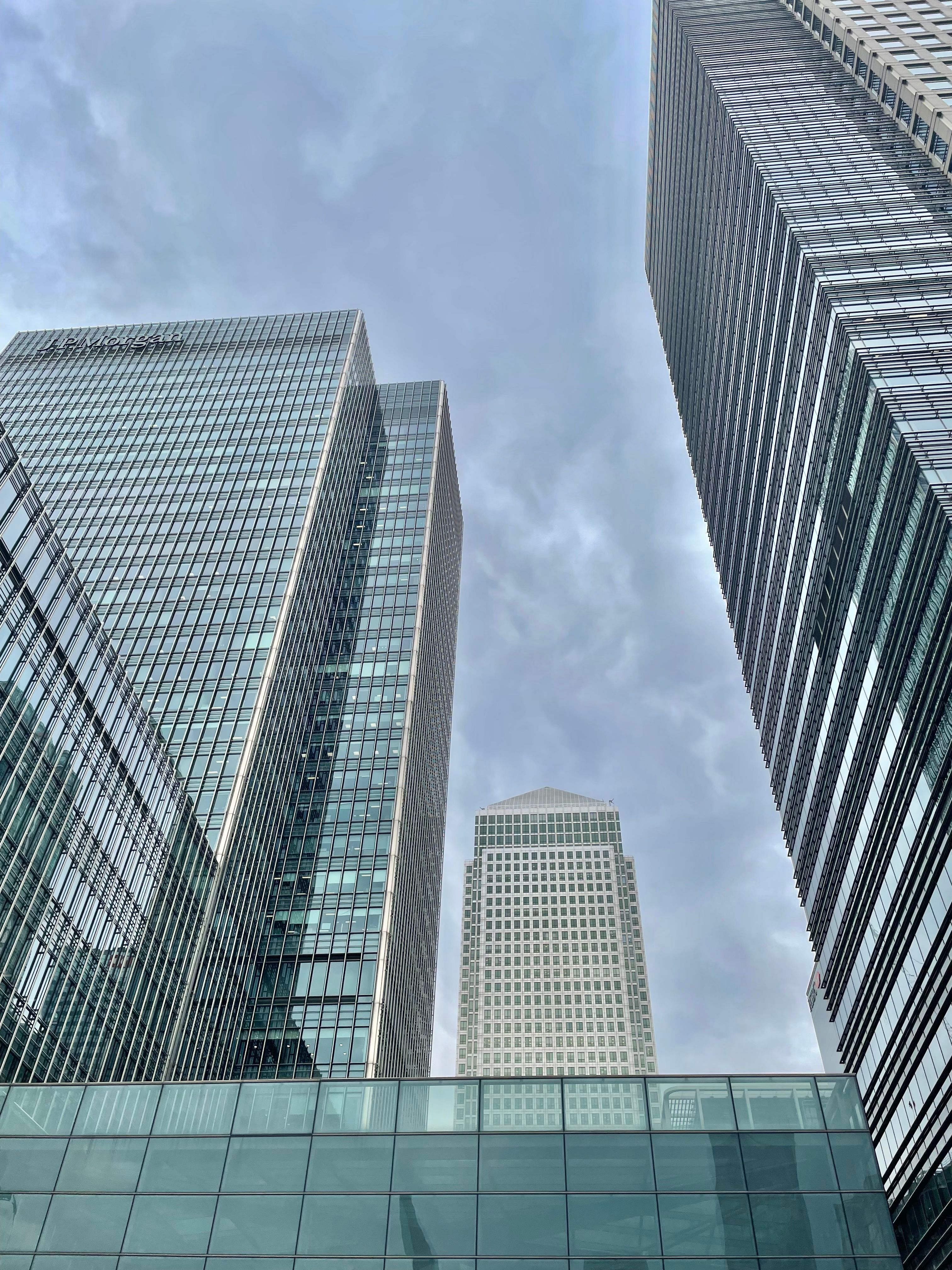 City Buildings Under Cloudy Sky · Free Stock Photo