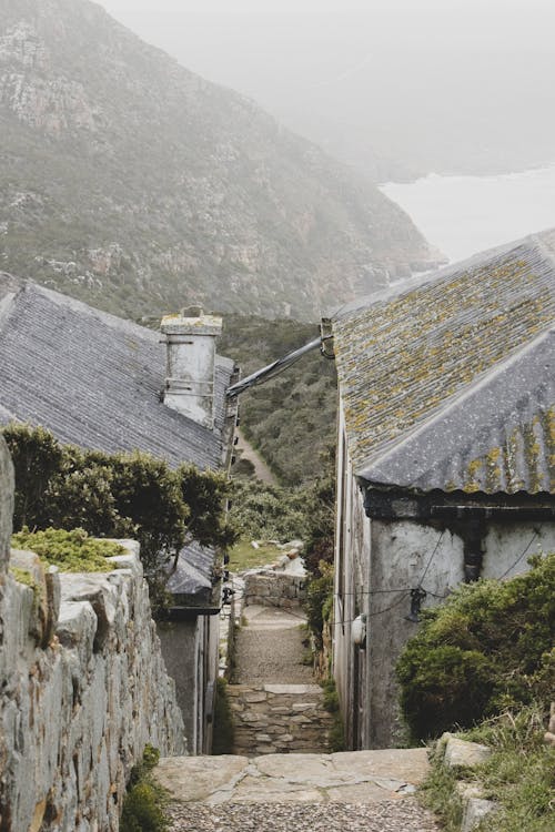 Stone Buildings in Mountains Landscape