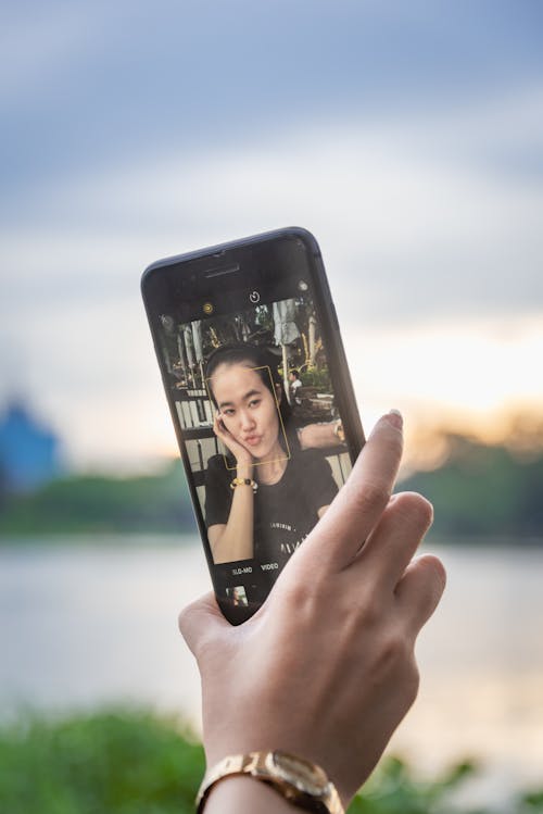 A Girl Taking Selfie Using Smartphone