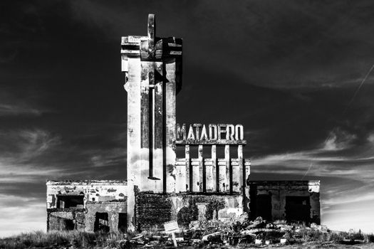 Black and white photo of the decaying Matadero building in Carhué, Argentina.