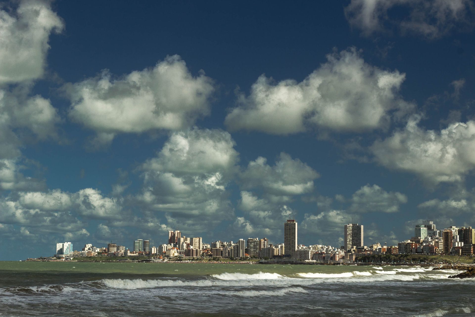 Beautiful view of Mar del Plata city skyline with ocean and clouds in Argentina.