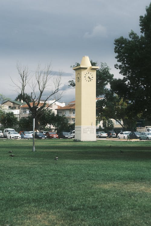 Concrete Clock Tower Near Car Park