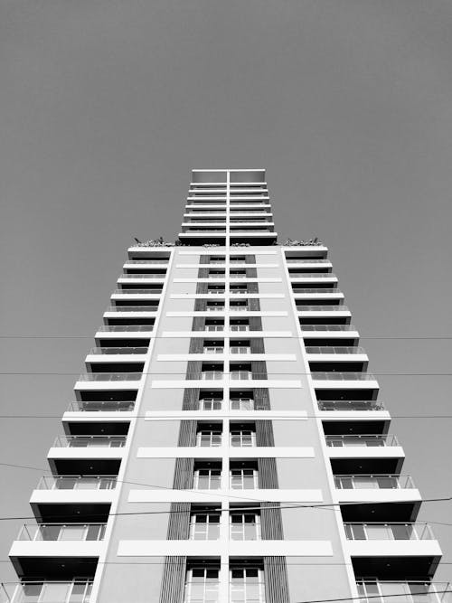 A Grayscale Photo of a Concrete Building