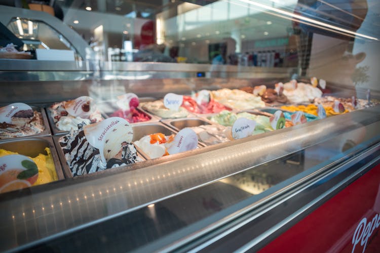 Assorted-flavor Of Ice Creams Inside Deep Freezer