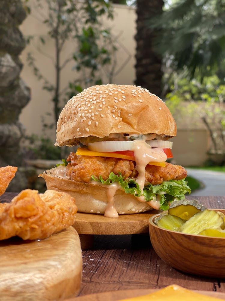 A Burger On The Wooden Plate