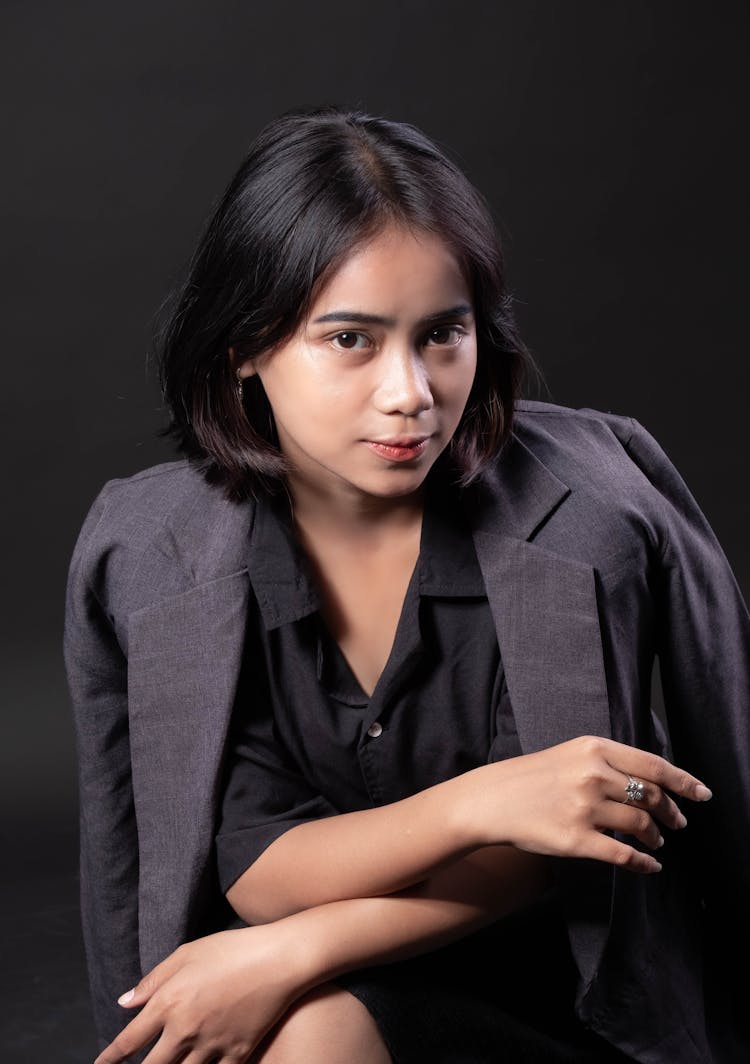 Woman In Gray Blazer Smiling