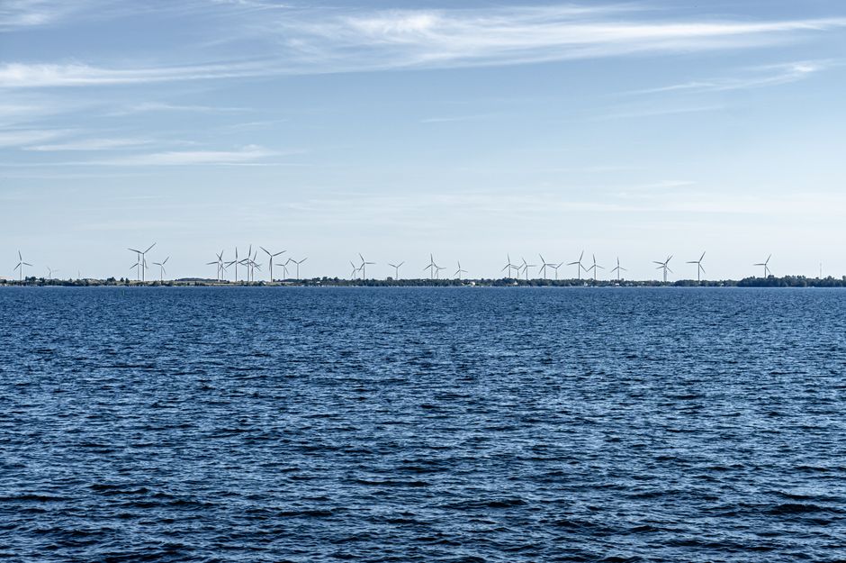 Panoramic view of wind turbines on the horizon over Lake Ontario in Kingston, Canada.