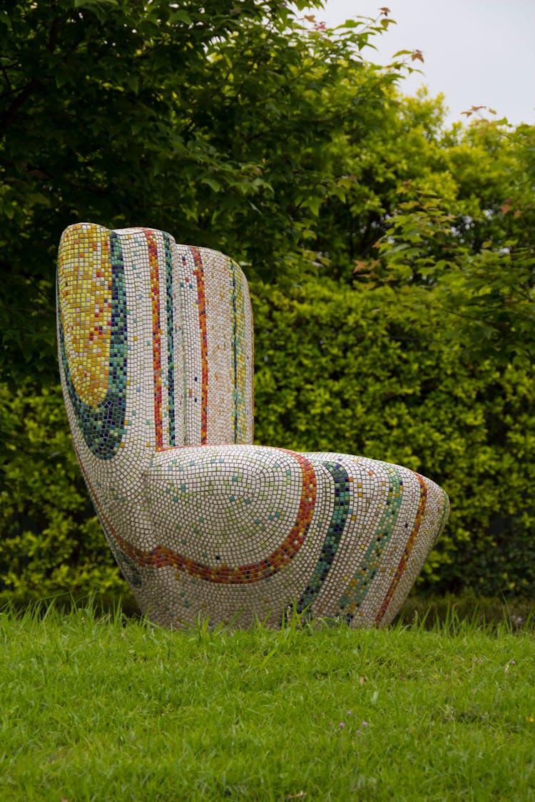 A Creative Mosaic Chair On The Grass