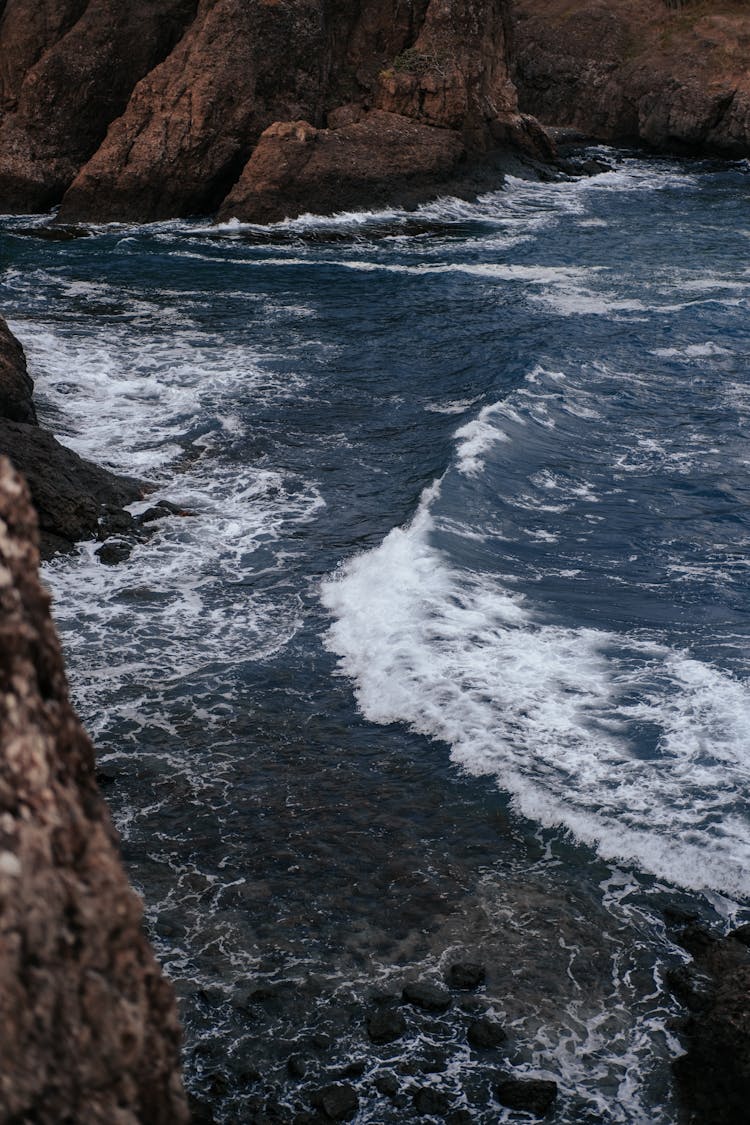 Sea Waves Crashing On Big Rocks