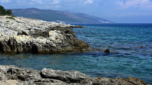 Free Explore the stunning rocky coastline of Duga Luka, Istria, Croatia with clear blue waters. Stock Photo