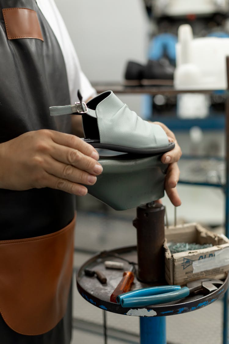 An Artisan Busy Making Shoe