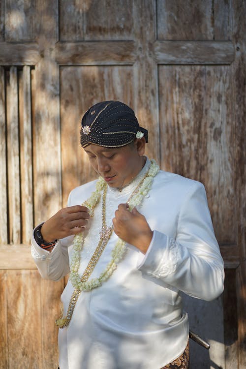 Asian Man in Traditional Clothing