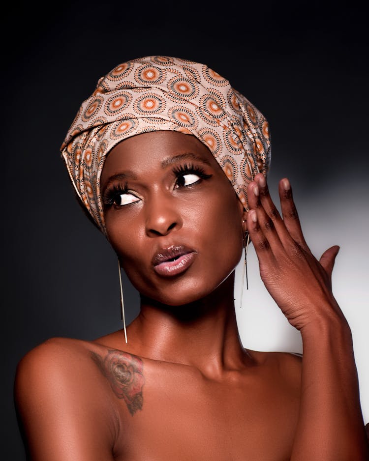 Portrait Of A Woman Wearing A Headwrap