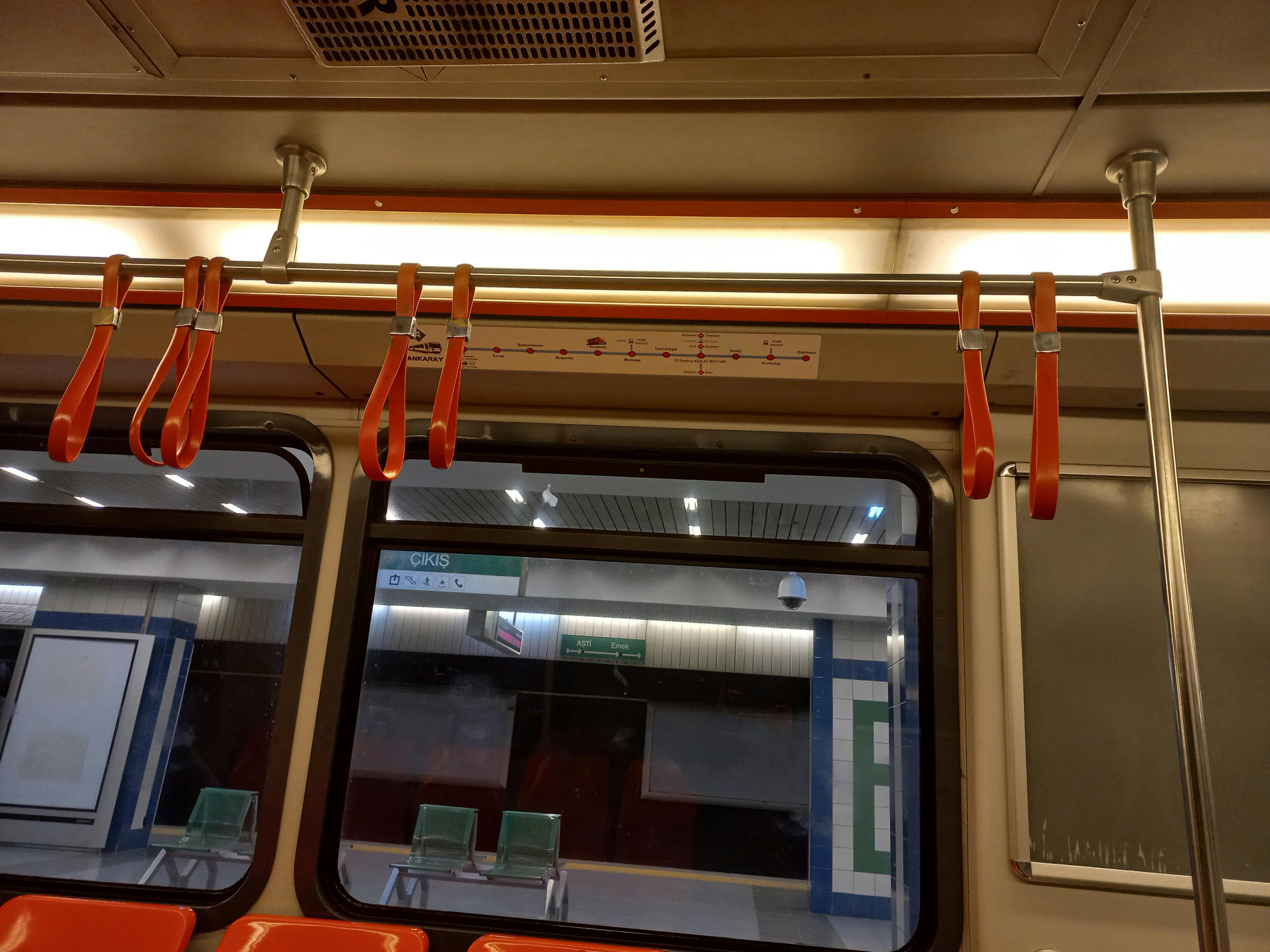 Cricketer playing a controlled cover drive in a day-night match