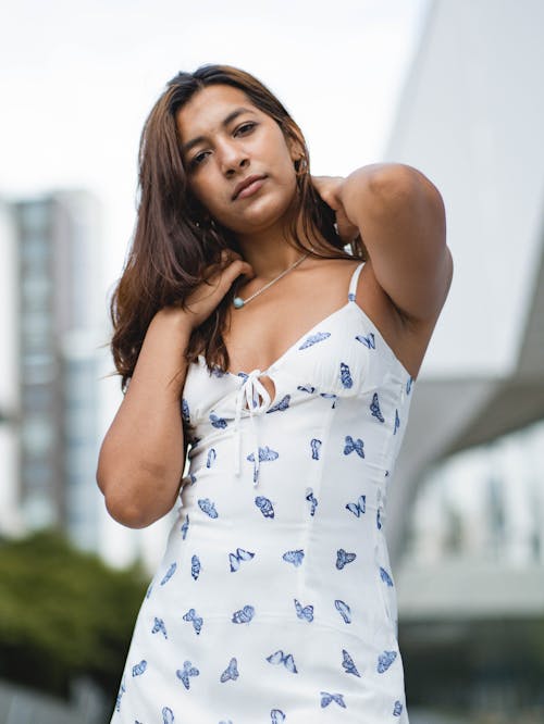 Brunette Woman in White Dress