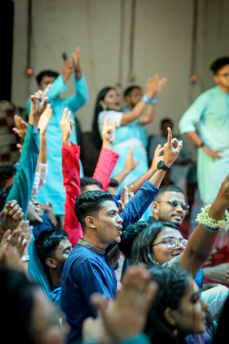 Happy People In Traditional Clothing Dancing Indoors