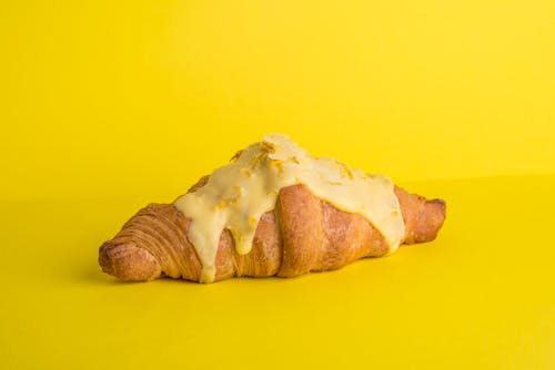 Close-up of a Croissant with a Yellow Glaze