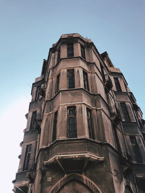 Brown Concrete Building under Blue Sky