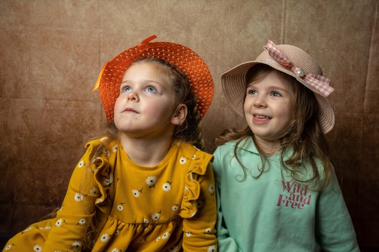 Photo Of Girls Wearing Hats