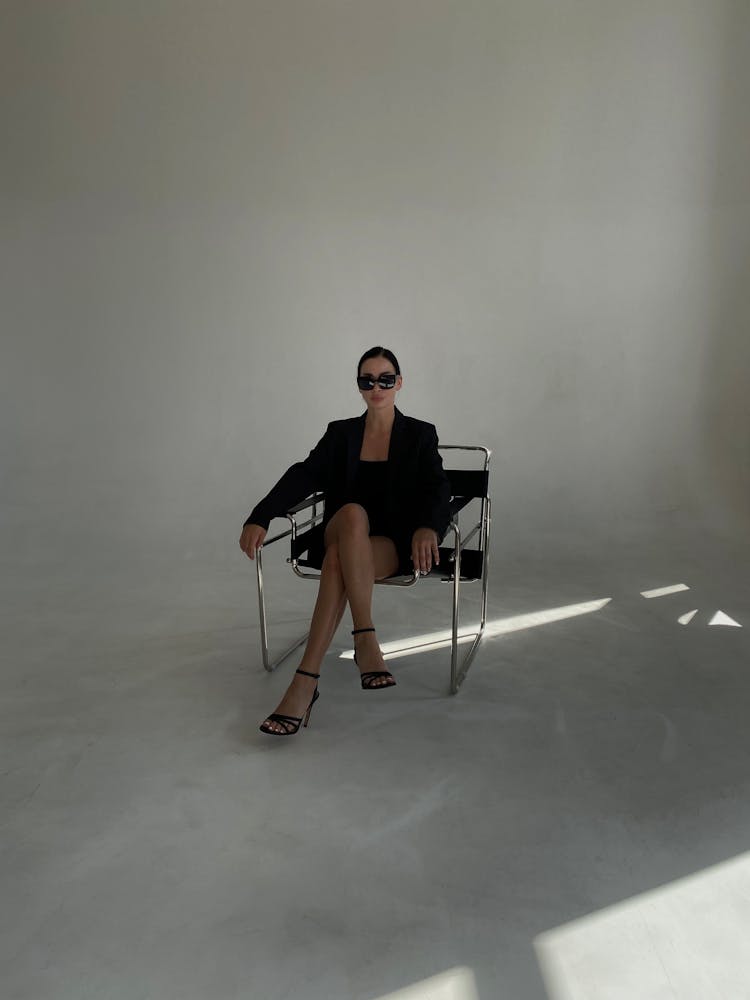 Businesswoman Sitting In Empty Room