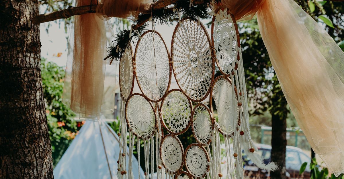 Ethnic Decoration on Tree in Garden · Free Stock Photo