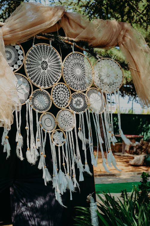Free An artistic arrangement of dream catchers outdoors, creating a bohemian vibe. Stock Photo