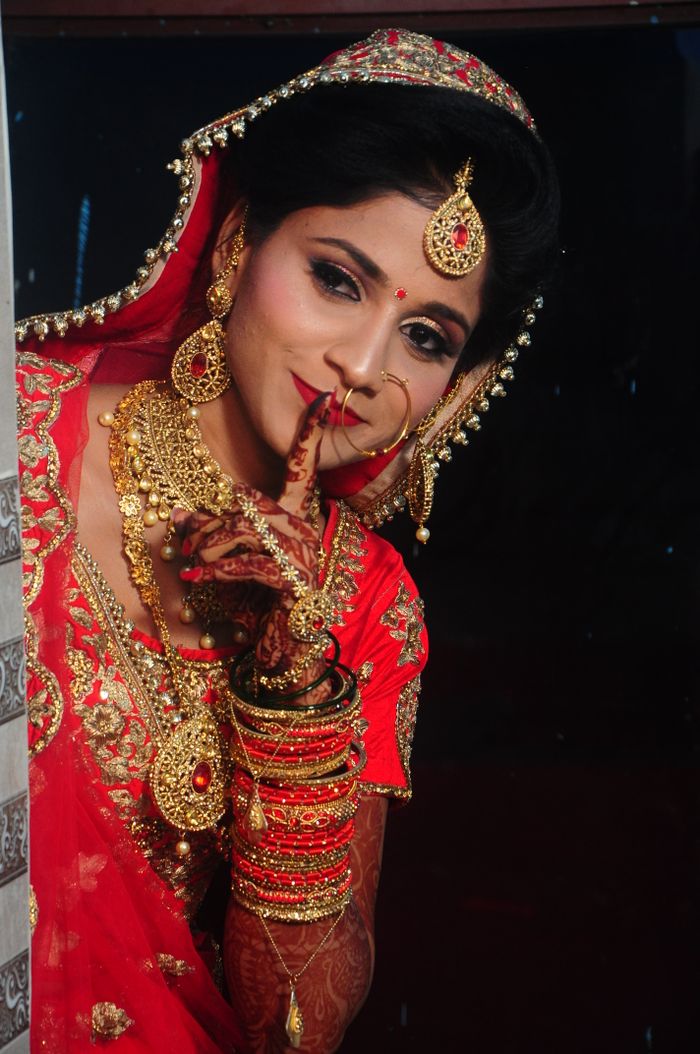 Bridal makeup with gold jewellery