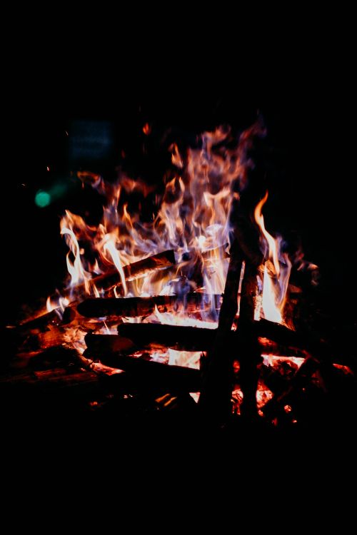 Free A striking bonfire with vibrant flames captured at night in Malaybalay, Philippines. Stock Photo