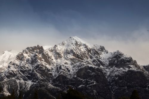 Free Stunning winter landscape of snow-covered Andes mountains in Bariloche, Argentina. Stock Photo