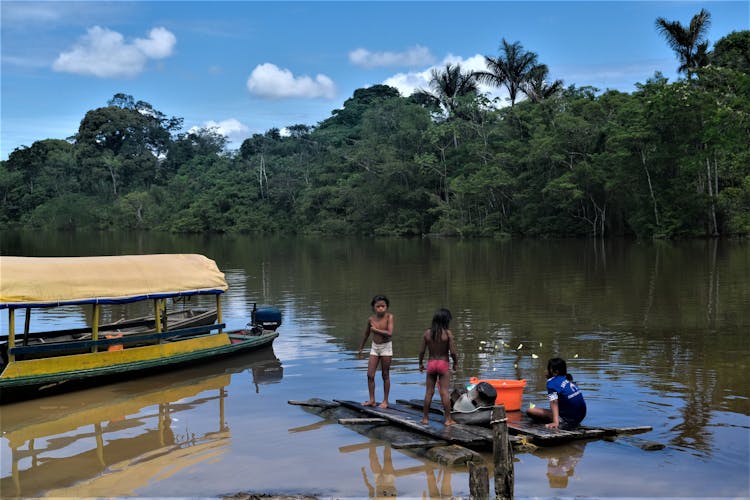 Kids Playing On Raft