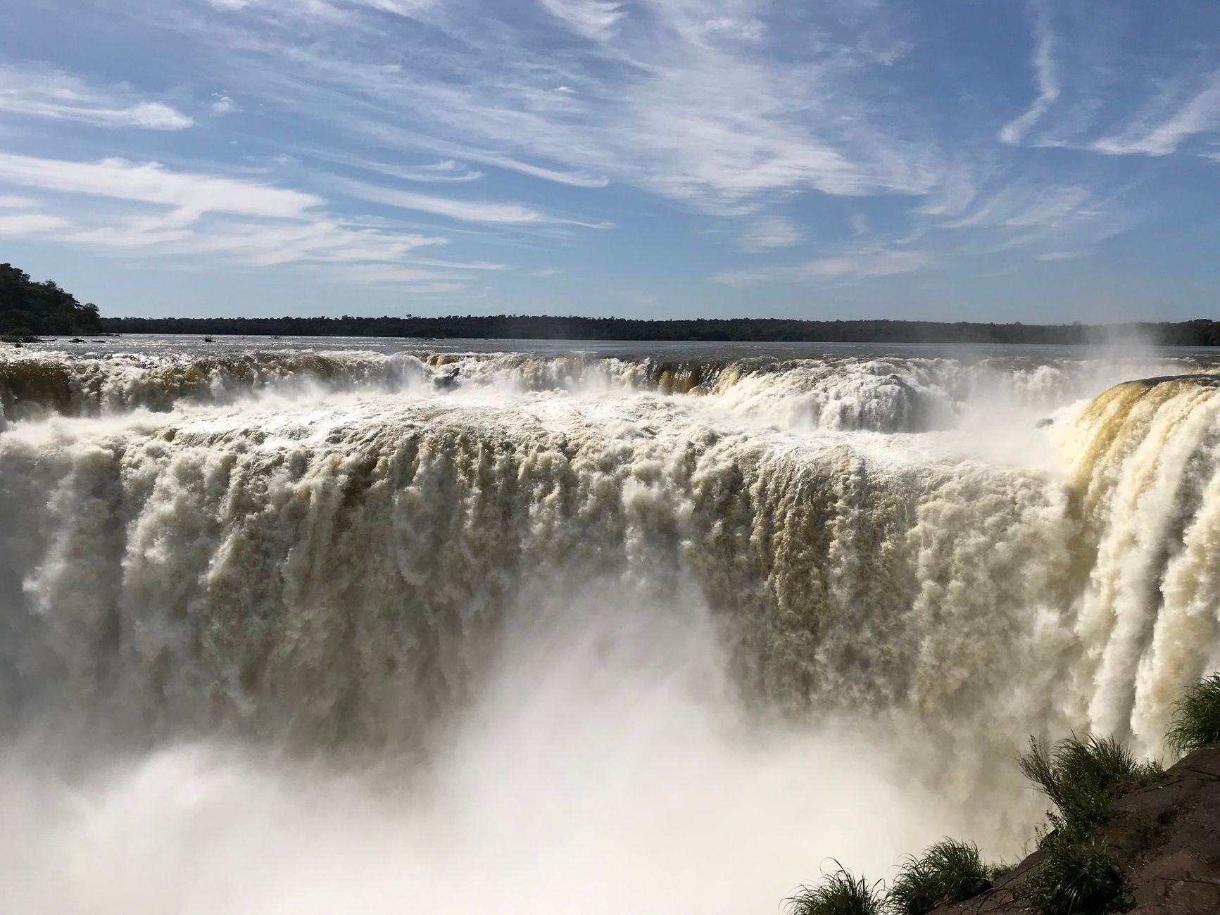 Suspended catwalk at Garganta del Diablo lip, Iguazú Falls Argentine side, looking into horseshoe canyon as falls drop into mist
