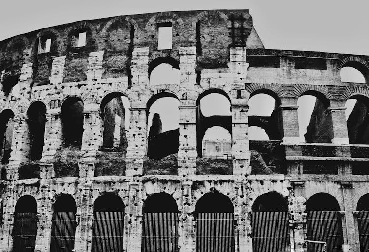 Grayscale Photo Of A Colosseum