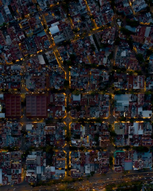 Aerial View of City Buildings at Night