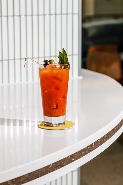 Free Bloody Mary Cocktail on Table Stock Photo