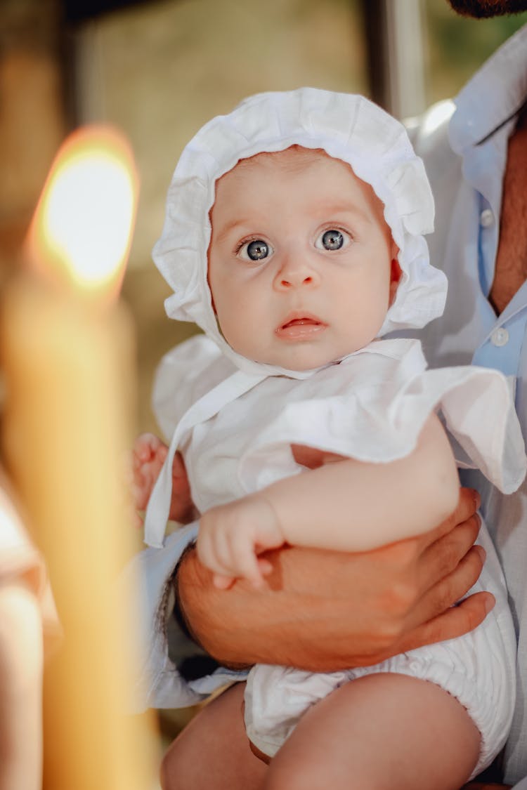 Family With Baby During Religious Celebration