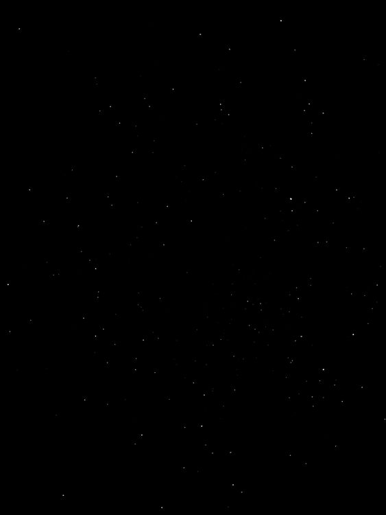 Free A stunning night sky full of brilliant stars twinkling against a dark backdrop. Stock Photo