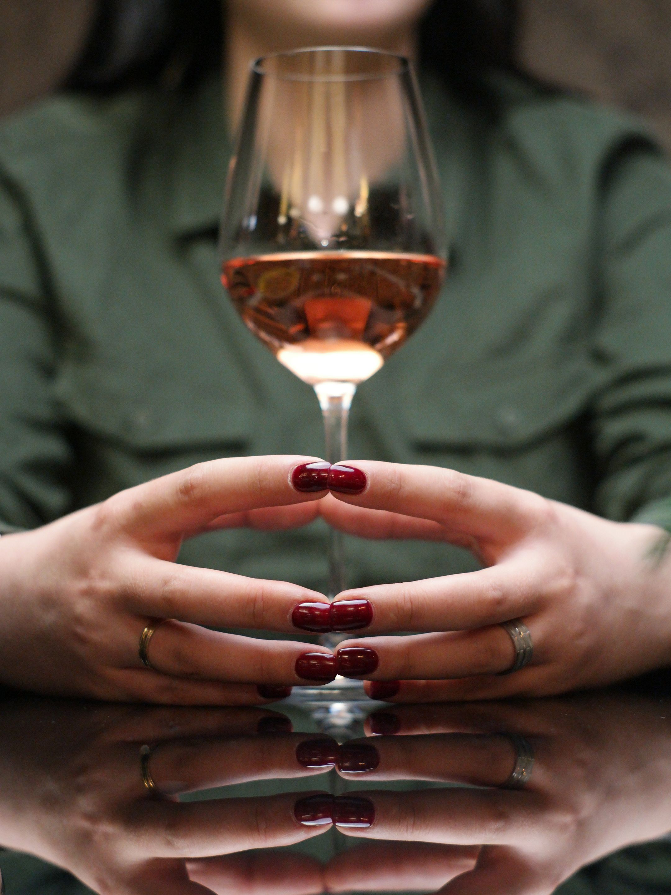 A Woman Holding a Glass of Wine · Free Stock Photo