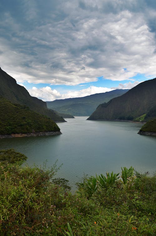 View of a Body of Water between Mountains 