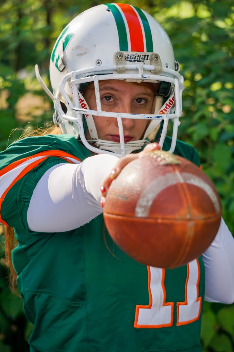 Footballer Holding Ball In Hand