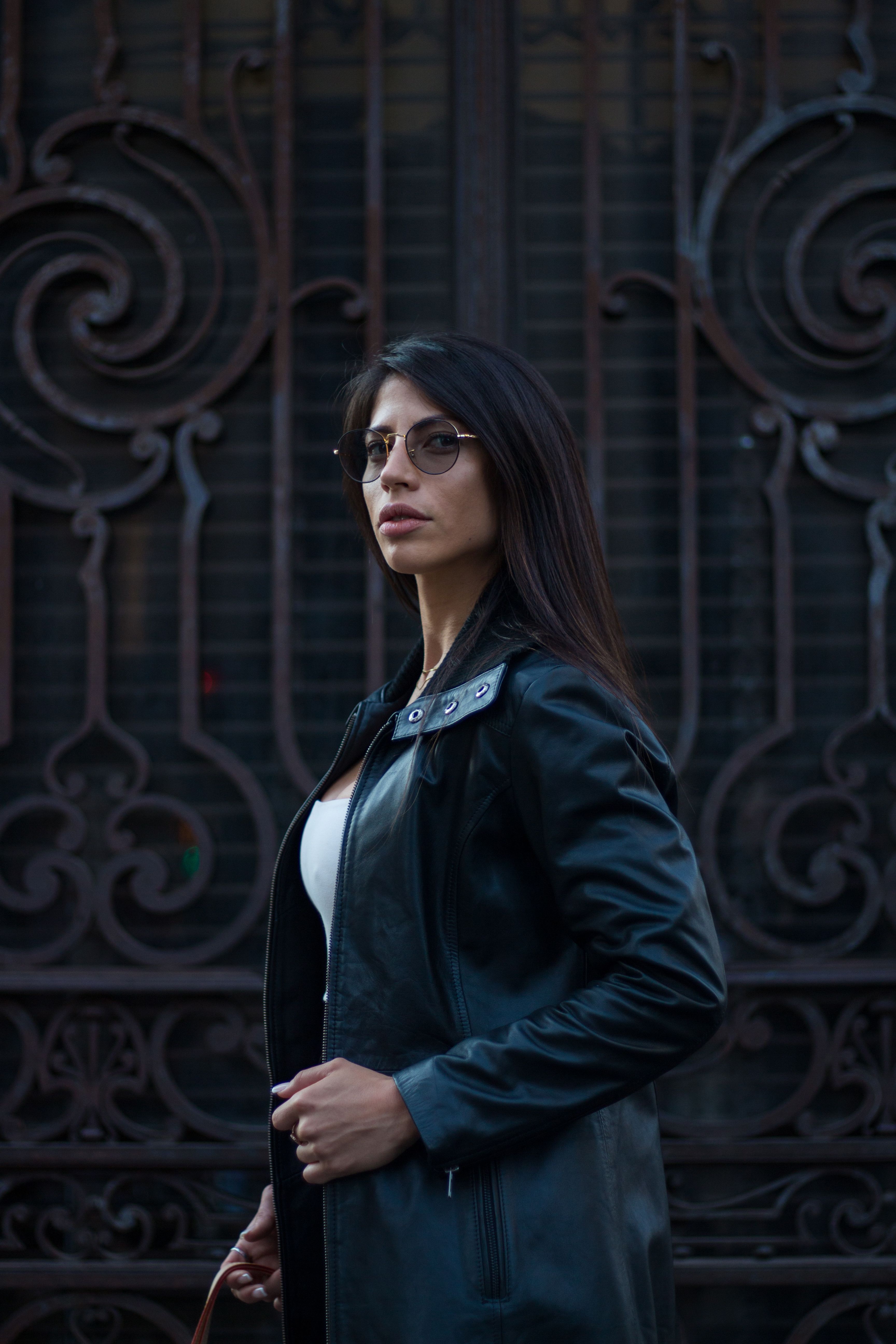 Woman in Black Leather Jacket Wearing Sunglasses · Free Stock Photo