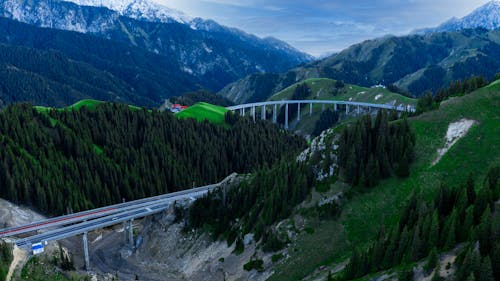 Aerial View of an Elevated Road and Bridge in Mountains