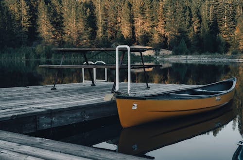 A Boat Docked on the Lake