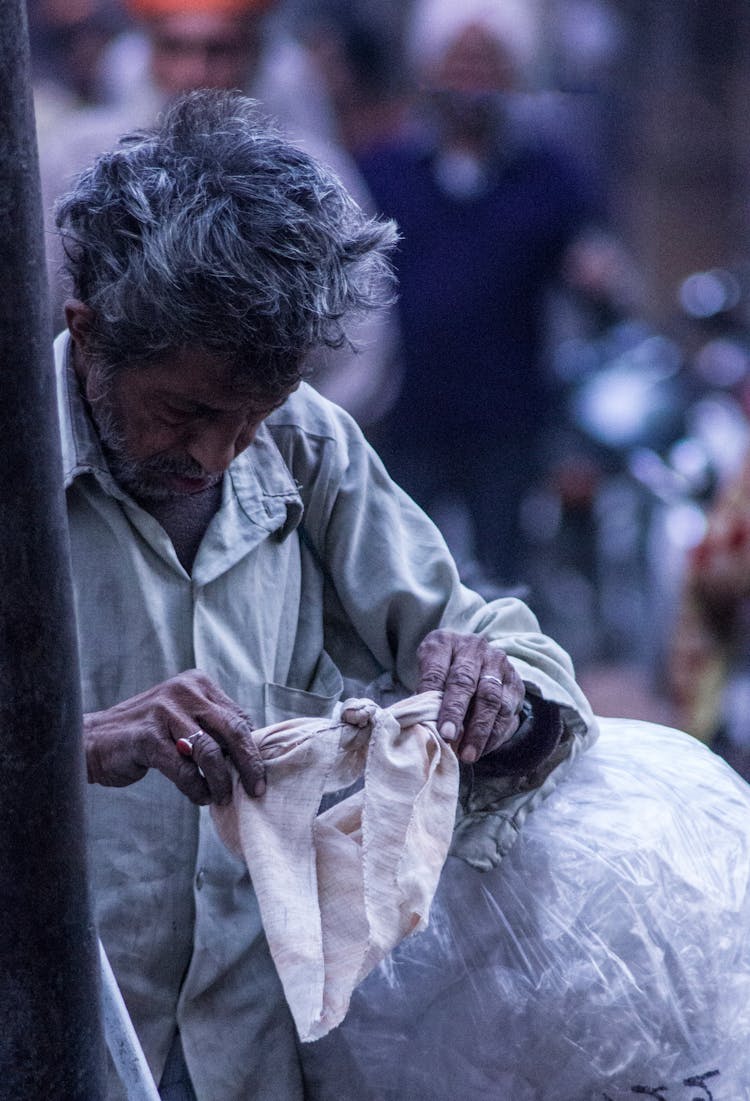 A Man Holding White Cloth