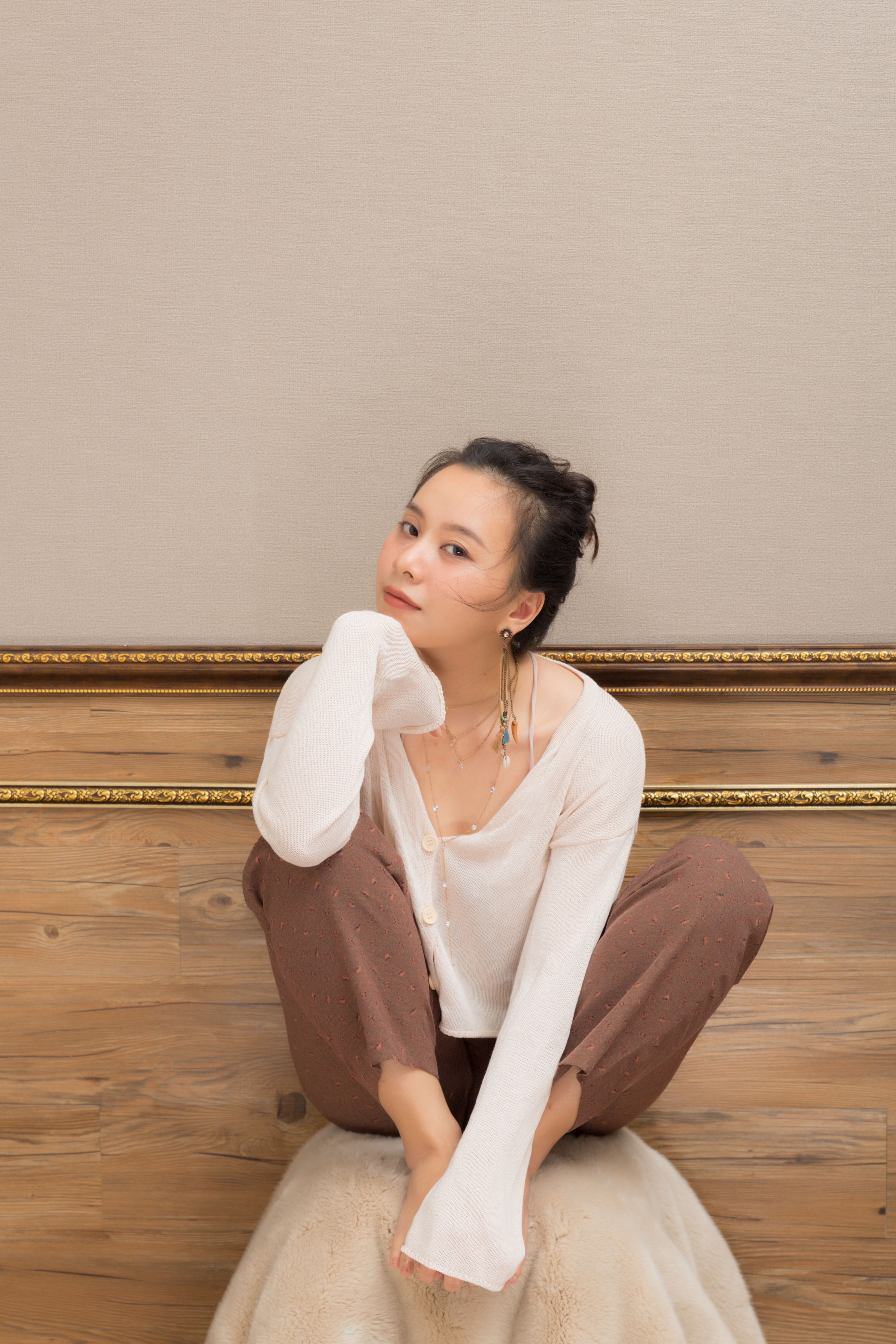 A Woman in White Long Sleeve Shirt and Brown Pants · Free Stock Photo