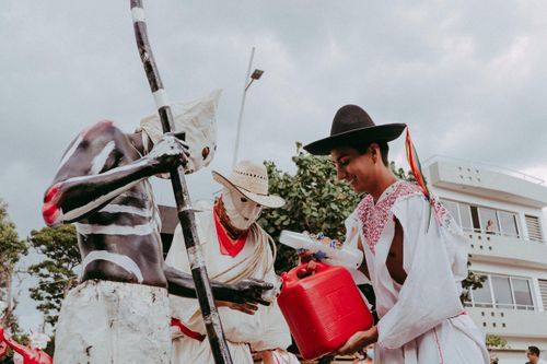 Free Vibrant depiction of a Mexican festival with traditional attire and cultural elements. Stock Photo