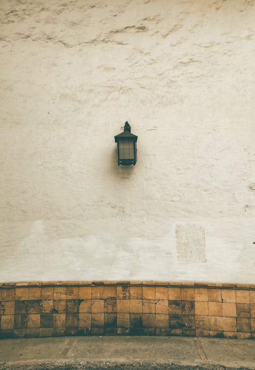 Lantern Hanging on Building Wall